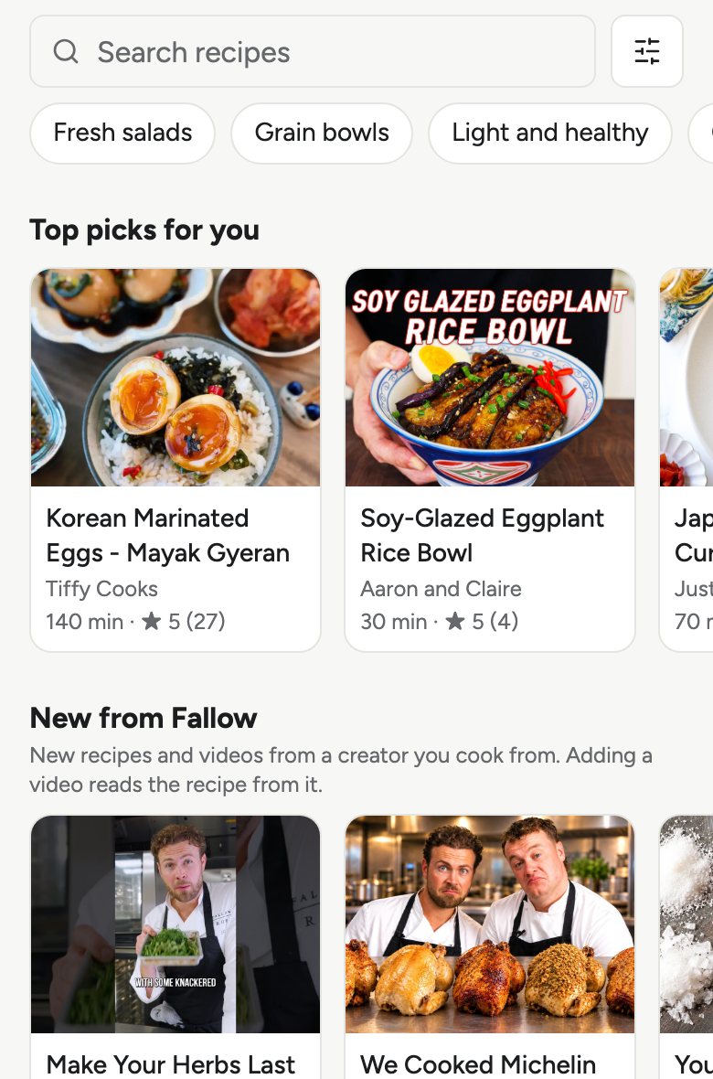 The Discover tab with a search box, theme chips and a row of top picks from kitchens the household cooks from